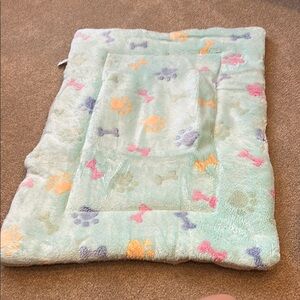 Colorful Pet Crate Mat with Paw and Bone Patterns